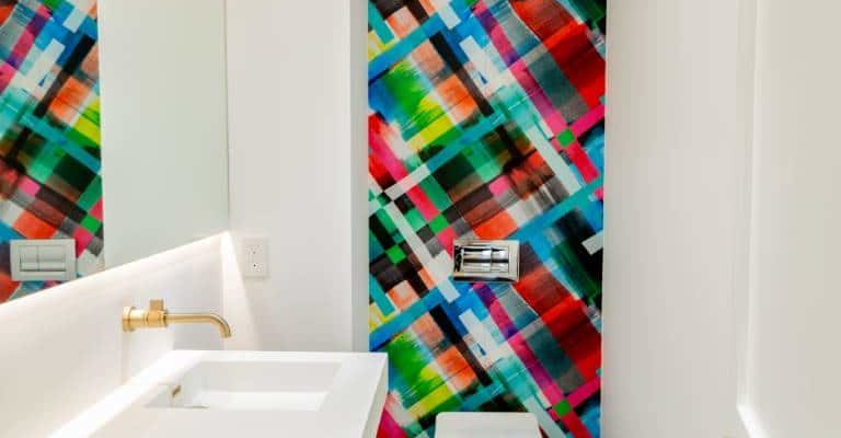 color wall in creative bathroom from custom home
