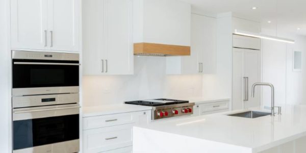 custom white kitchen with modern design