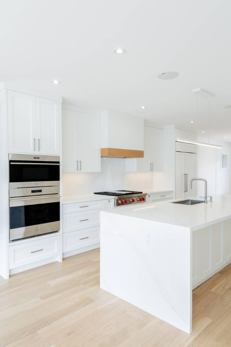 custom white kitchen with modern design